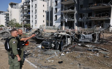 Israel says it killed senior Iranian commander Saeed Izadi as both sides attack