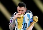 Ifoto idasanzwe ya Lionel Messi aterura igikombe cy’Isi yaguzwe akayabo