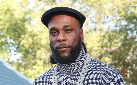 Messi na Ronaldo ntibari mu bakinnyi batatu Burna boy afata nk’ibihangange ku isi